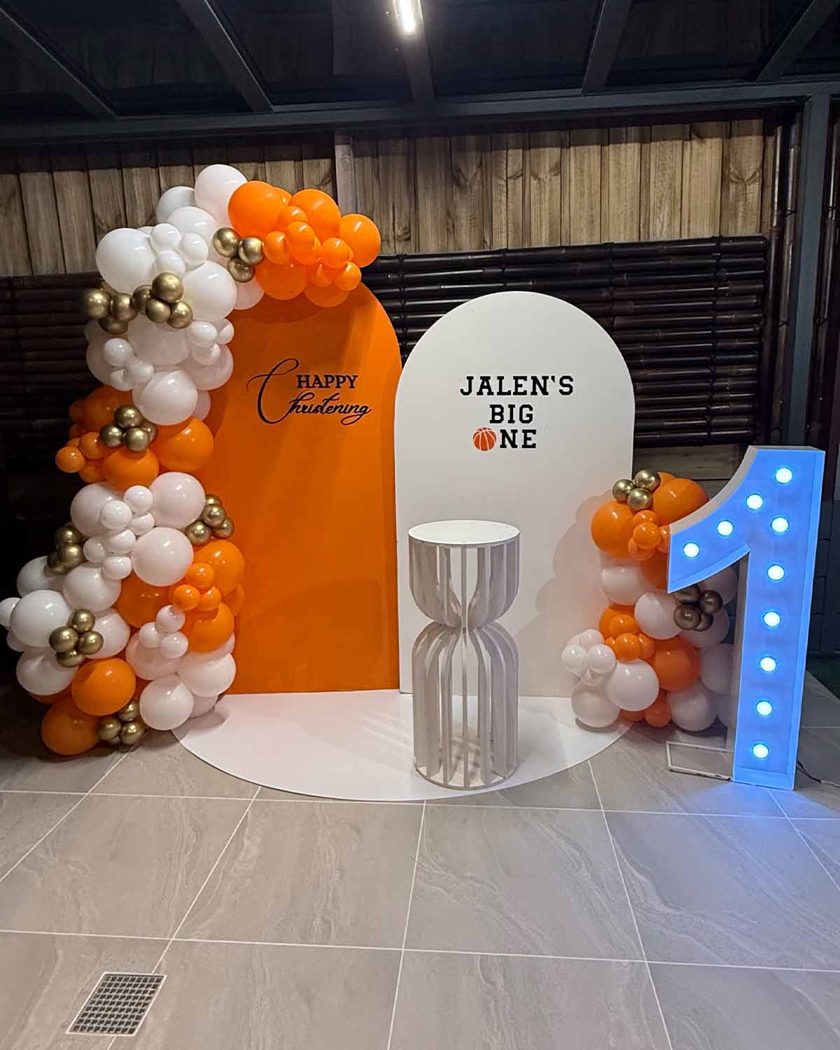 Orange and white birthday backdrop package hire Melbourne
